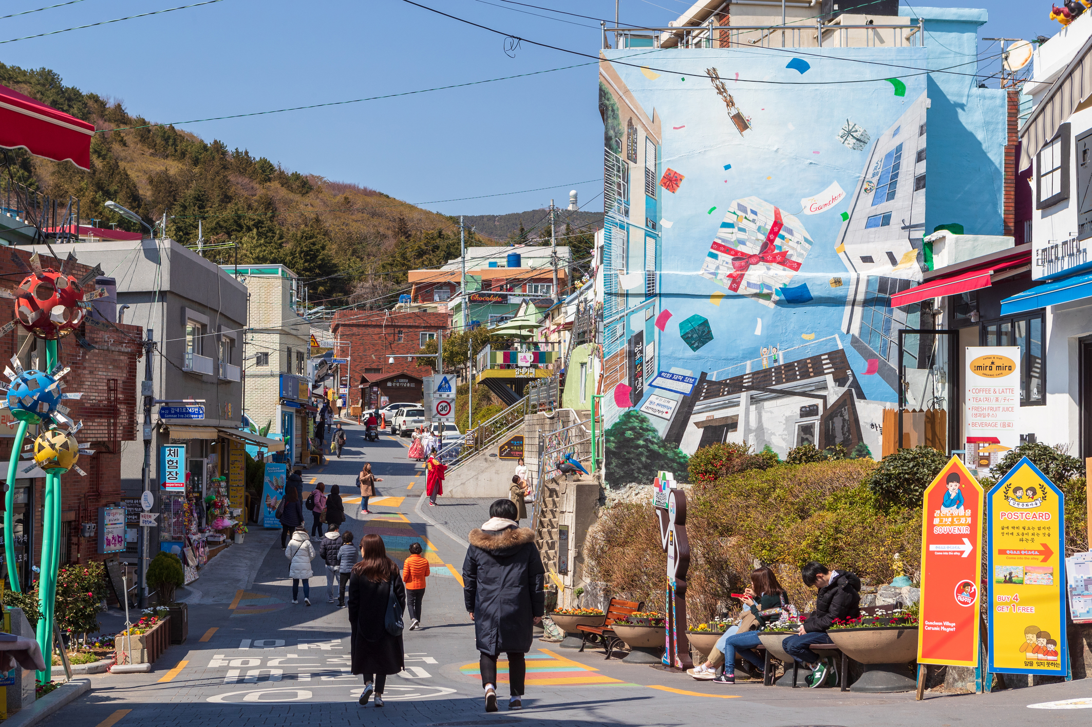 Explore the charming streets of Gamcheon Culture Village where colorful murals and unique architecture create a delightful backdrop for leisurely strolls and cultural discoveries in Busan.